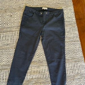 Jolt jeans. Bluish/grey color. Zipper detail at the ankle.